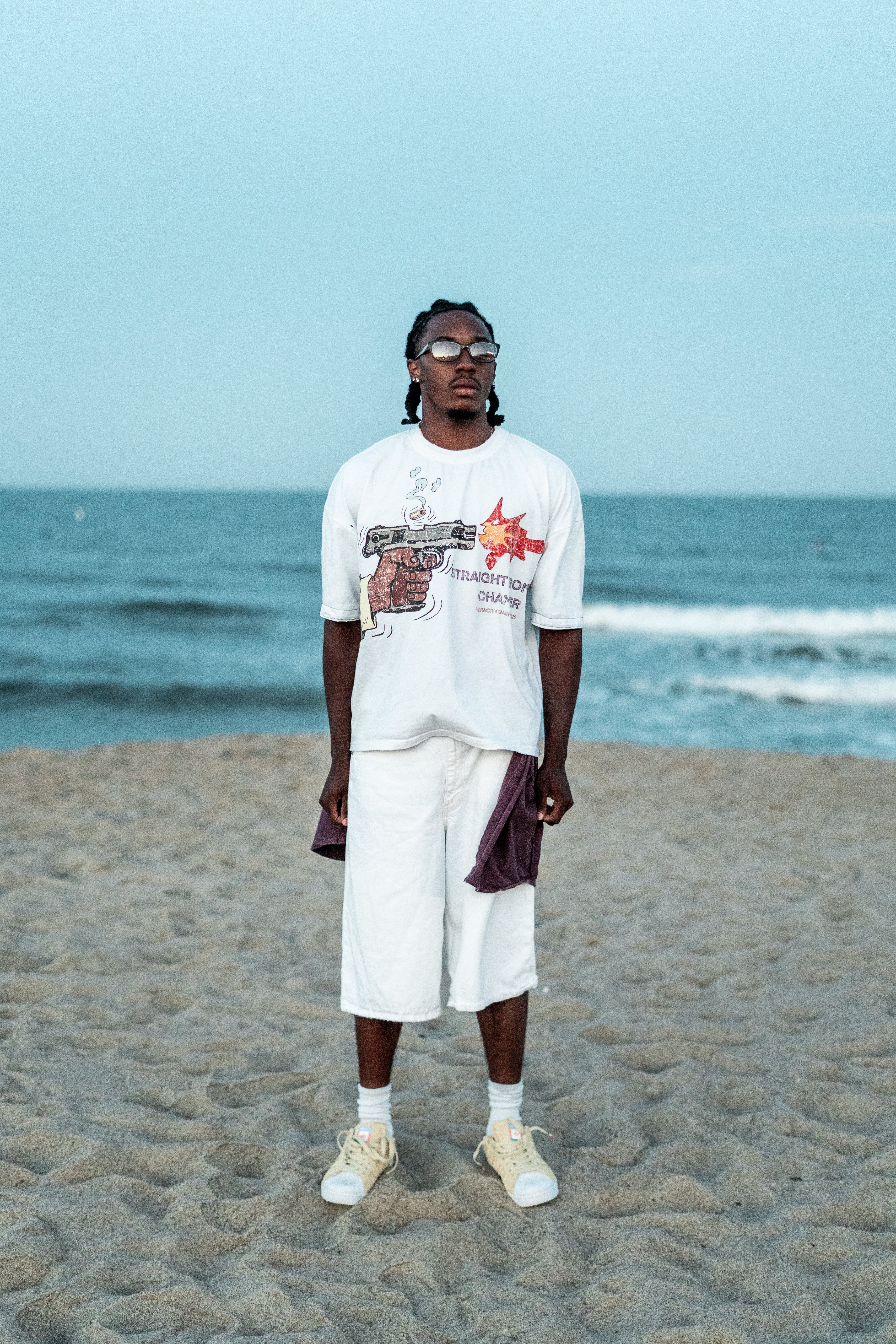 Chamber Tee on model, beach location